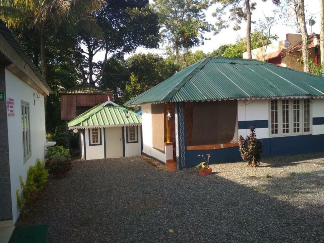 Green Garden Cottage Thekkady Bagian luar foto